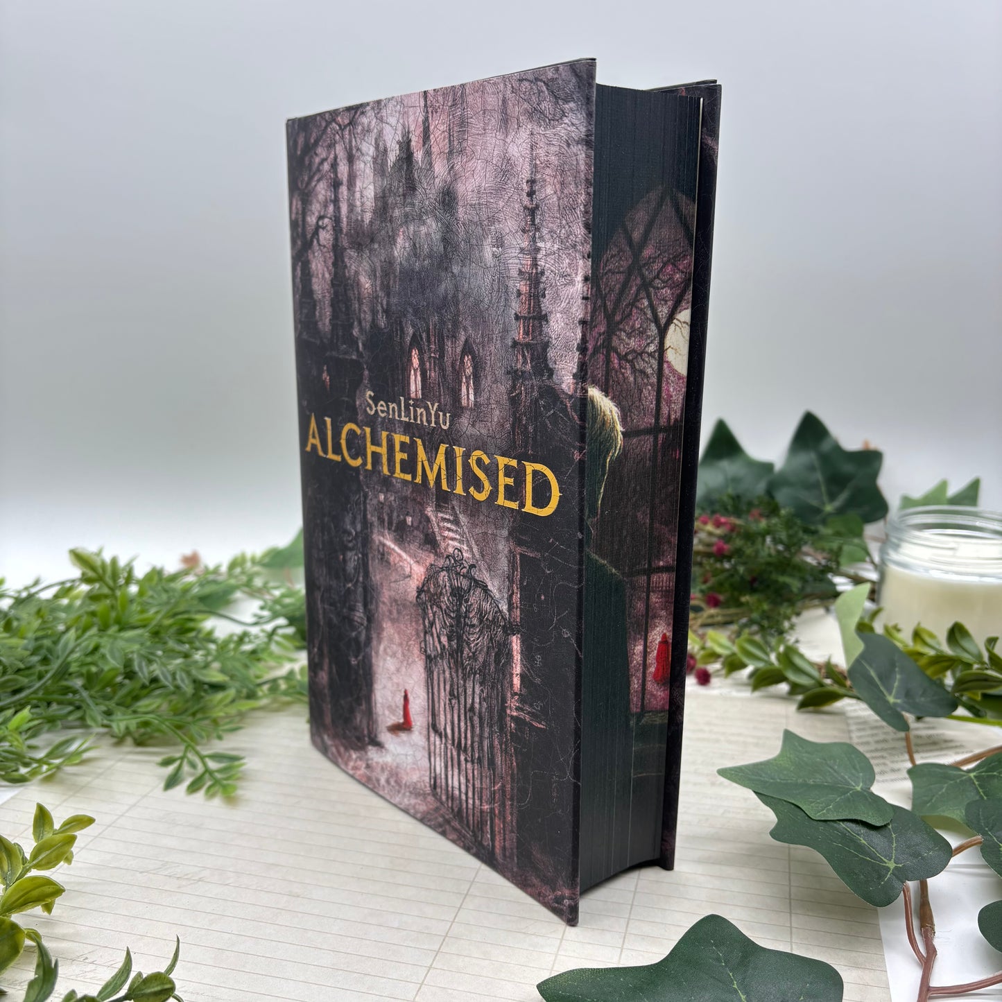 Special edition hardcover set of Alchemised by SenLiYu with custom printed edges