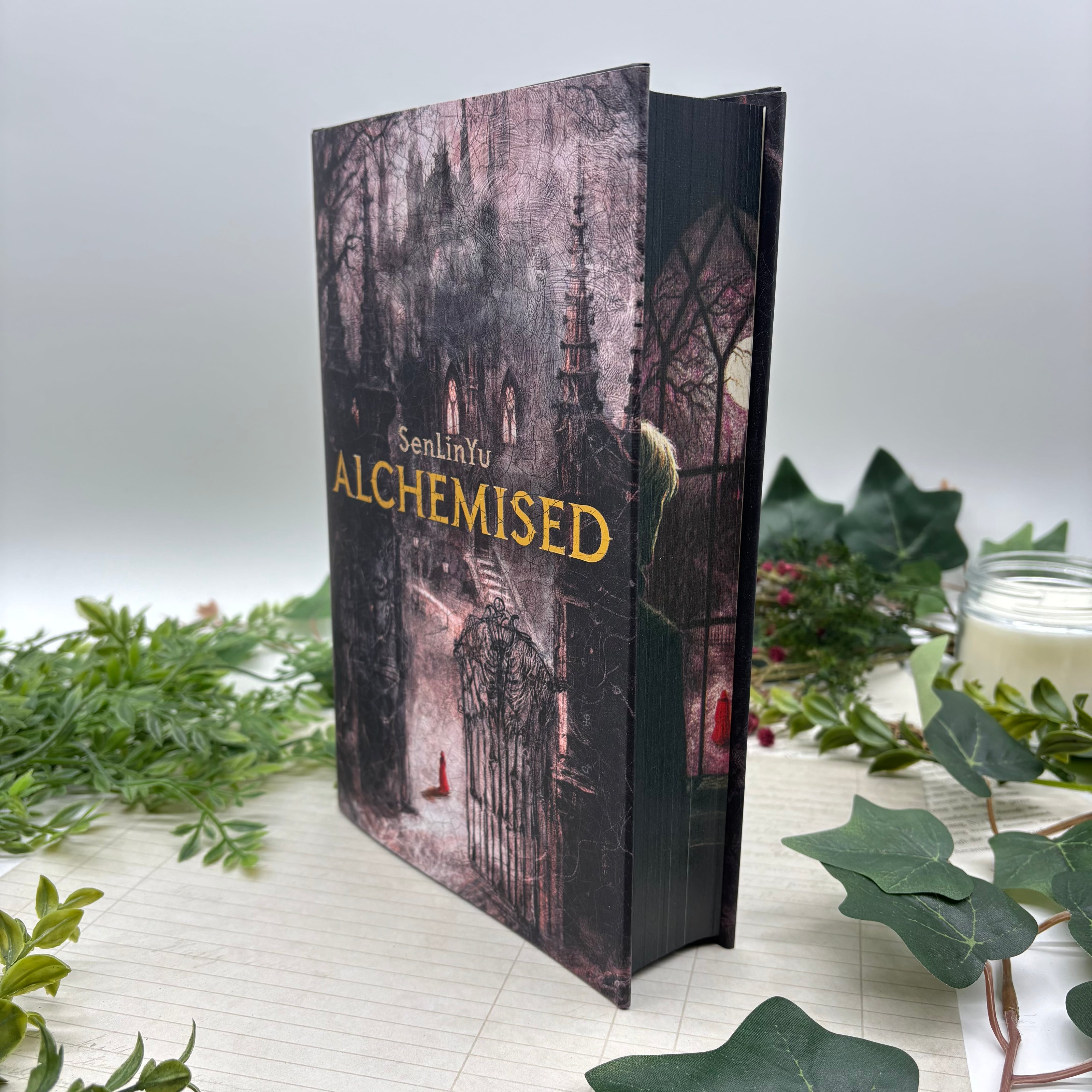 Special edition hardcover set of Alchemised by SenLiYu with custom printed edges