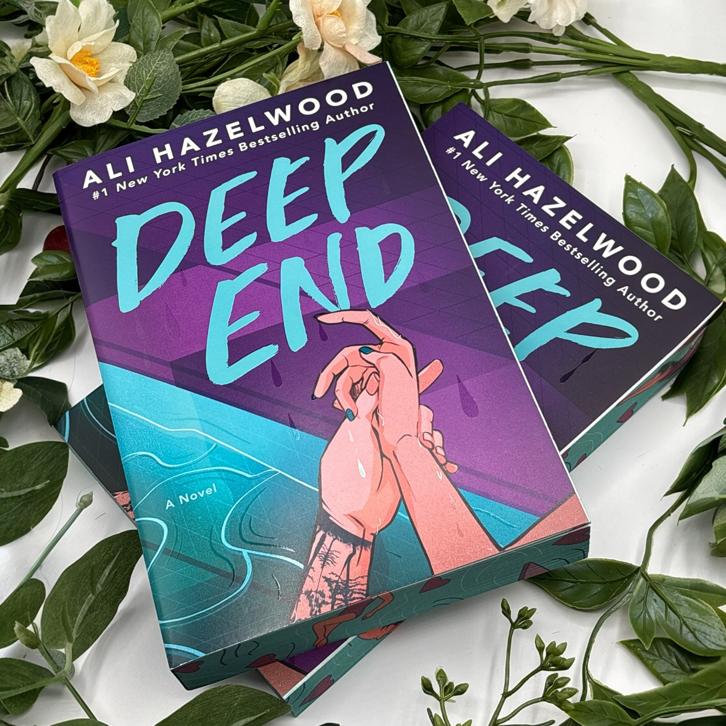 close up of custom edges on Deep End by Ali Hazelwood special edition paperback