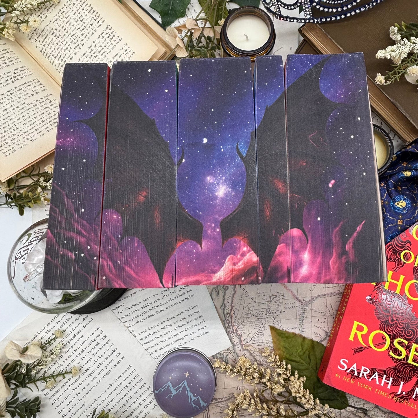 Close-up of night sky and bat wings sprayed edges on ACOTAR Velaris Edition paperbacks