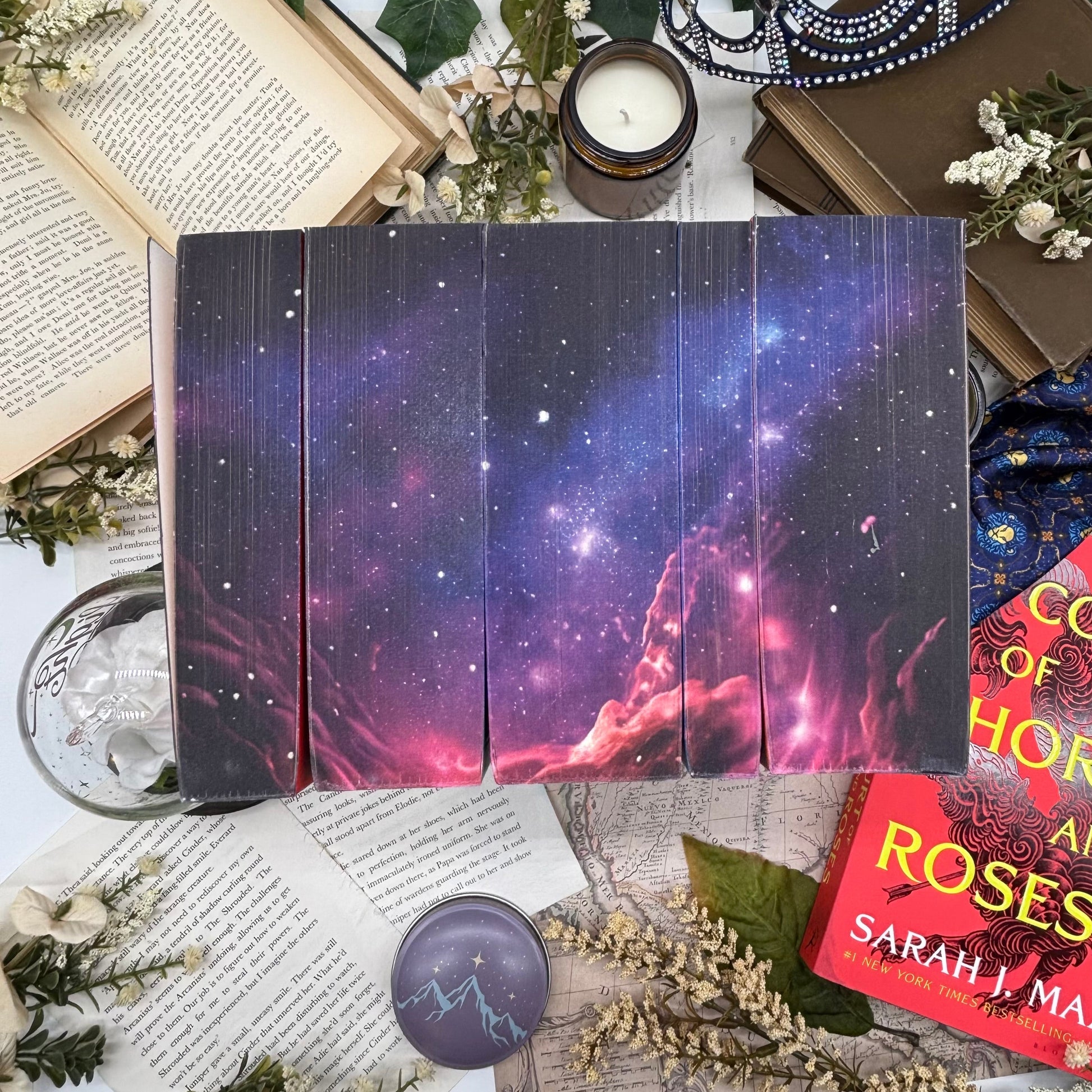 Close-up of night sky sprayed edges on ACOTAR Velaris Edition paperbacks