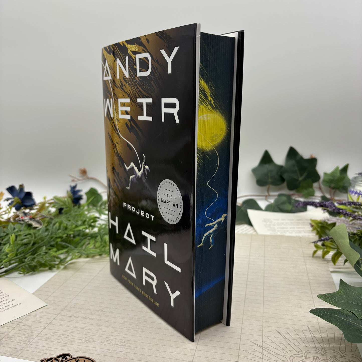 Special edition hardcover of Project Hail Mary by Andy Weir featuring custom designed printed edges