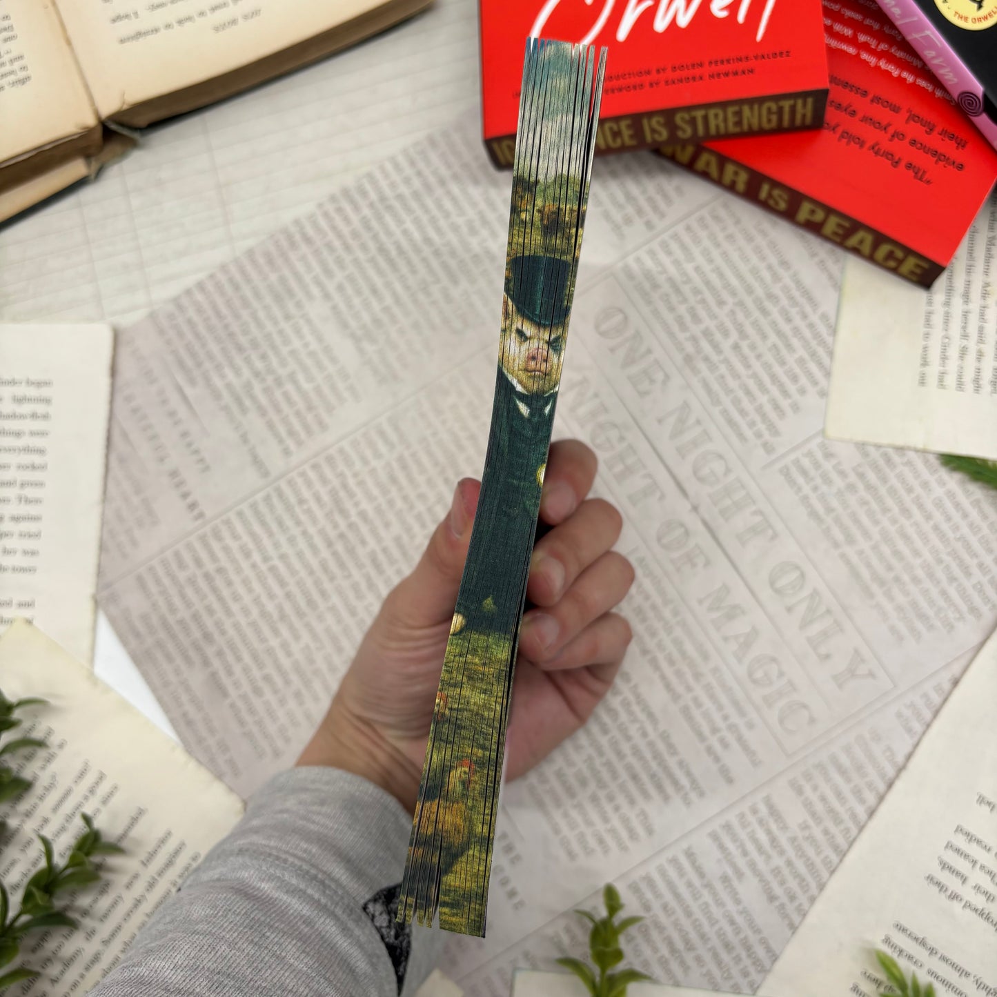 side view of Animal Farm paperback showing custom designed edges special edition