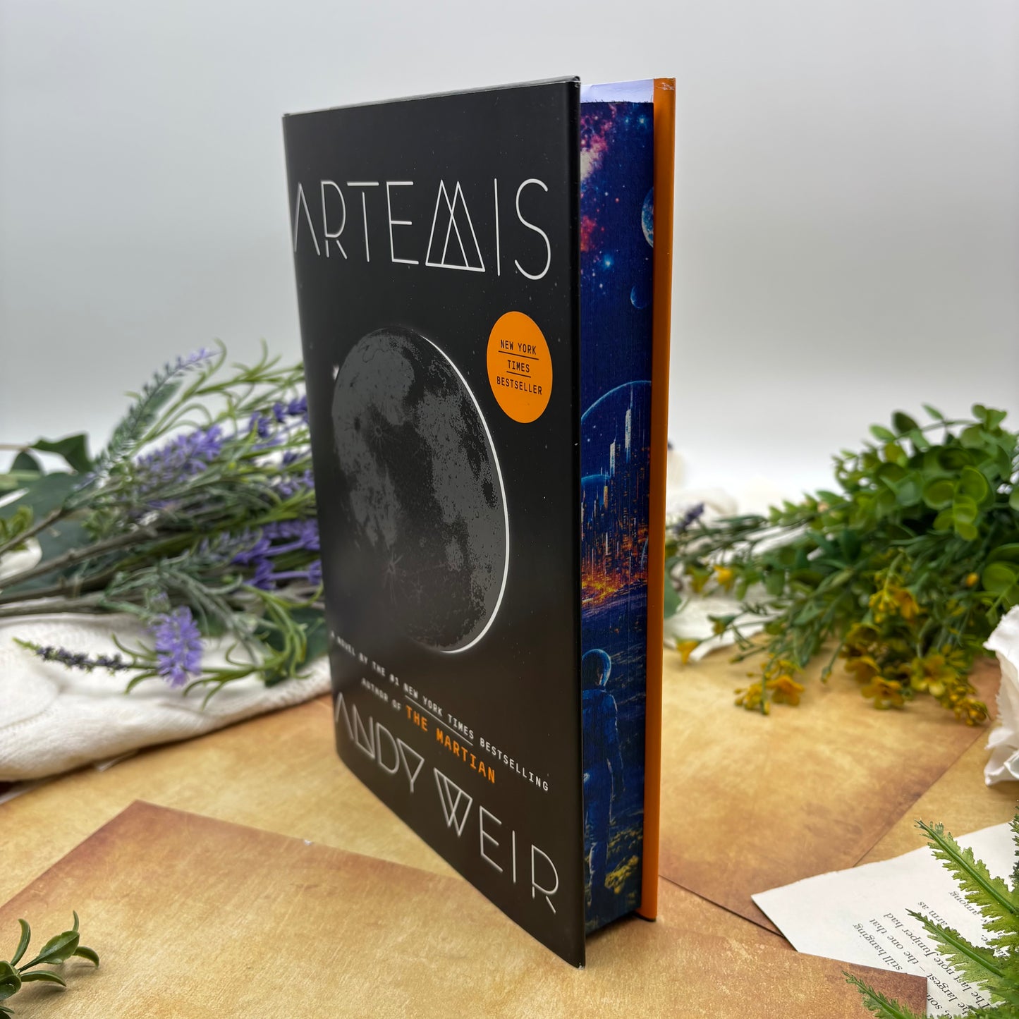 Artemis by Andy Weir special edition hardcover with custom designed edges side view