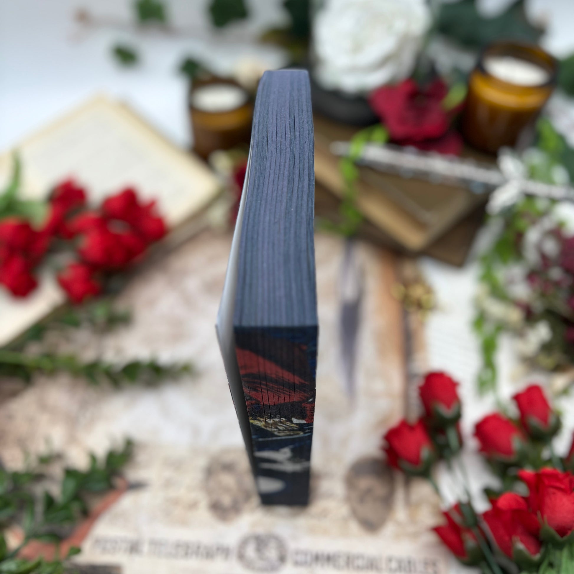 Bride special edition paperback with stenciled edges by Ali Hazelwood bottom
