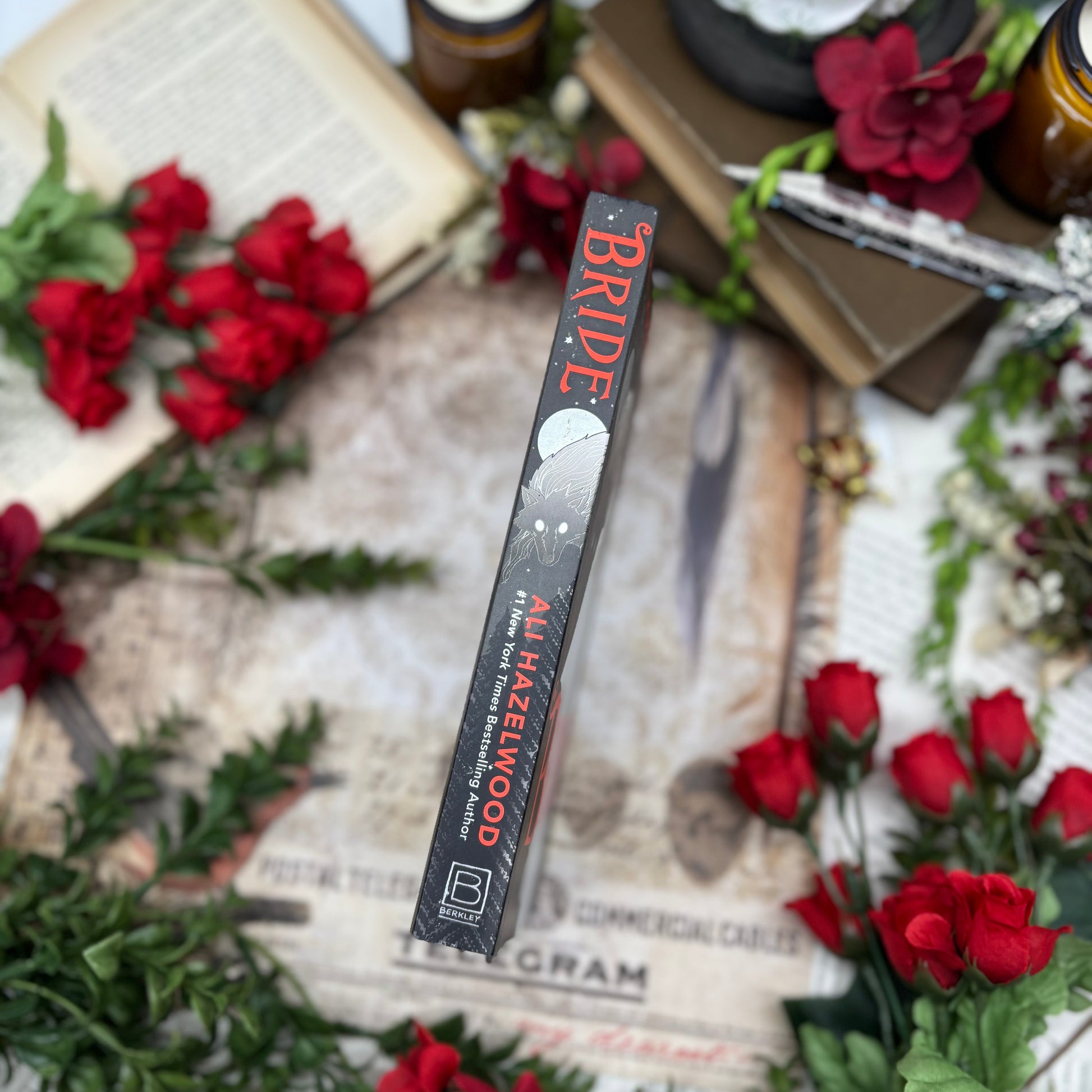 Bride special edition paperback with stenciled edges by Ali Hazelwood spine