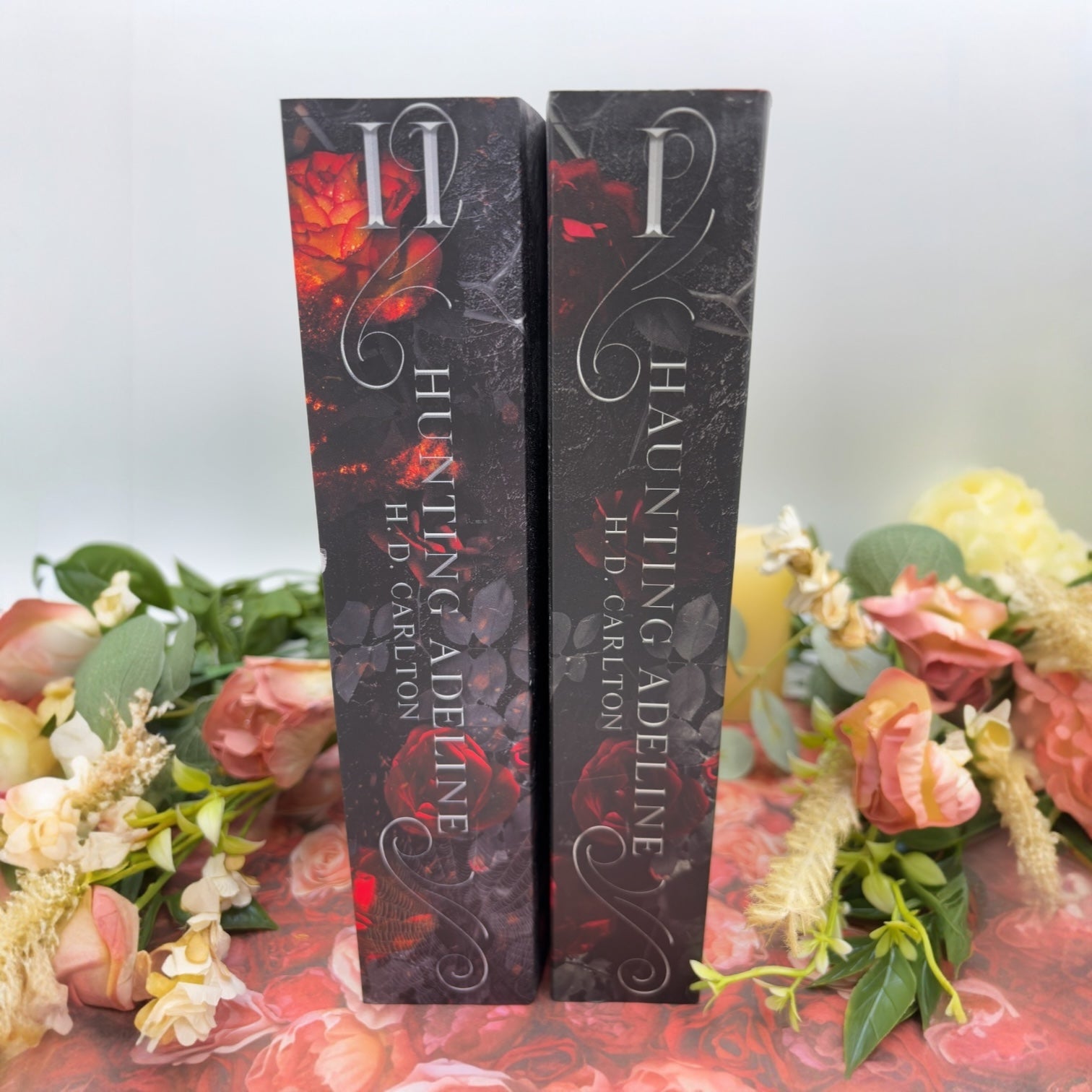 Special edition paperback set of Haunting Adeline and Hunting Adeline by H.D. Carlton with custom edges