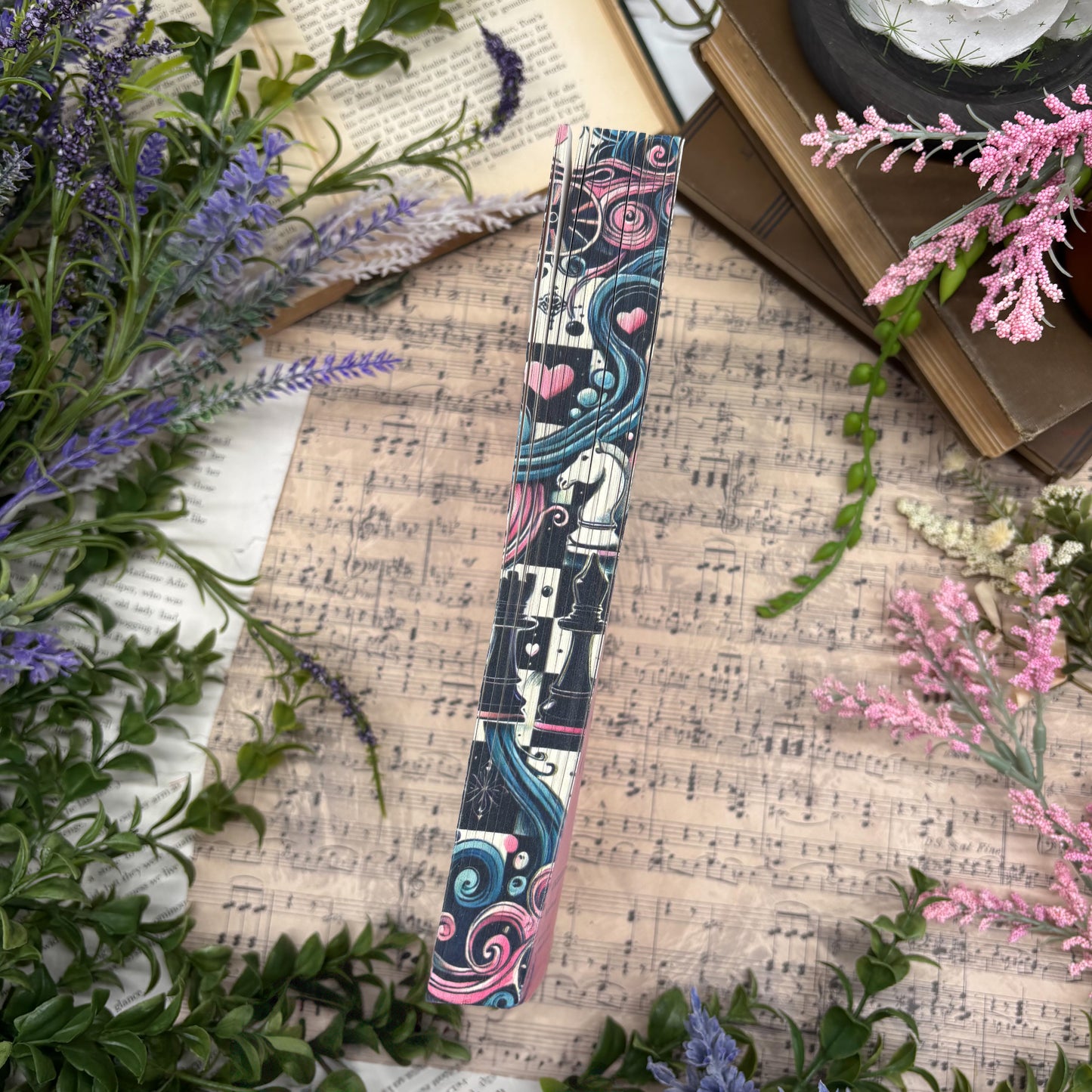 Checkmate special edition paperback box set with stenciled edges by Ali Hazelwood  middle