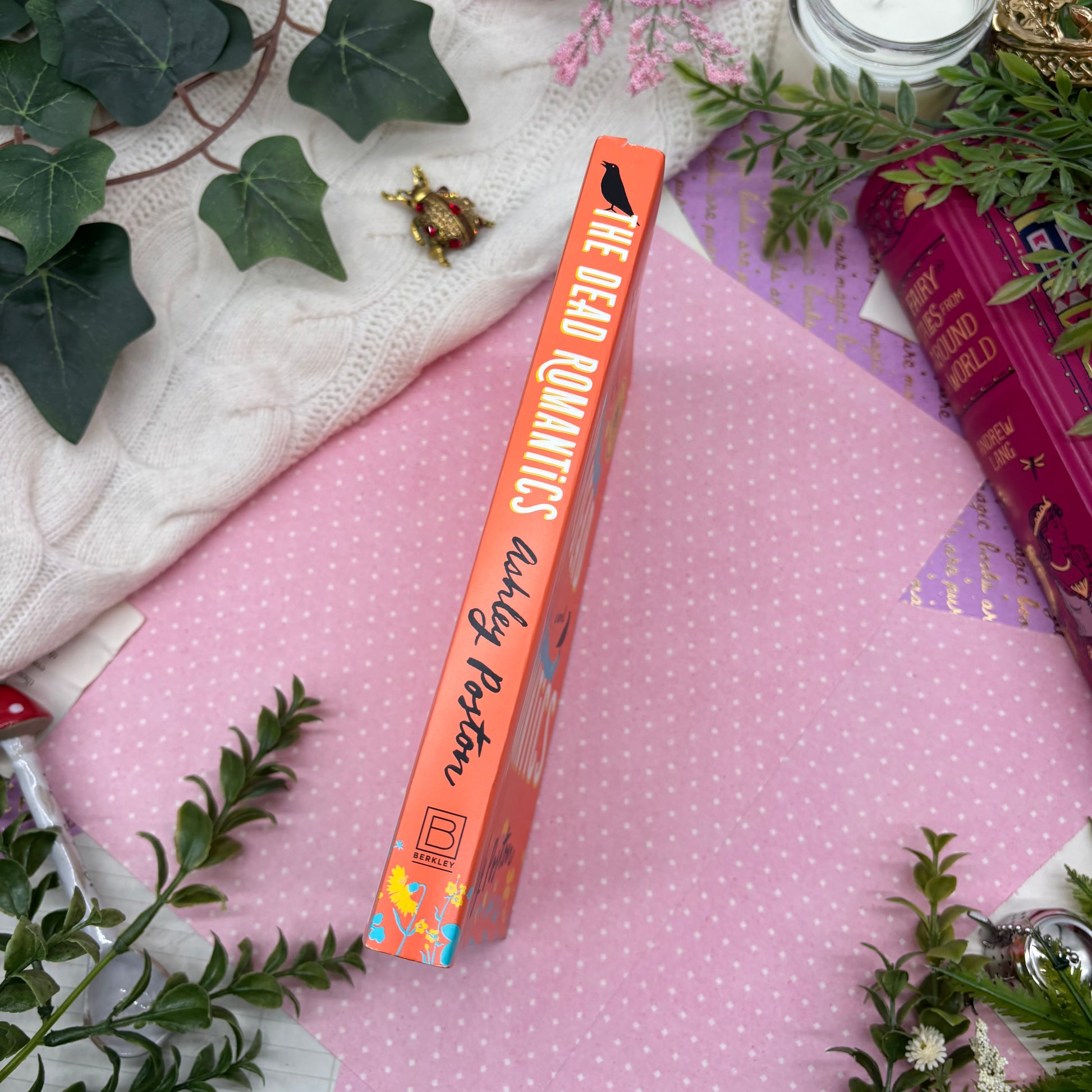 The Dead Romantics by Ashley Poston special edition paperback with custom designed edges spine view