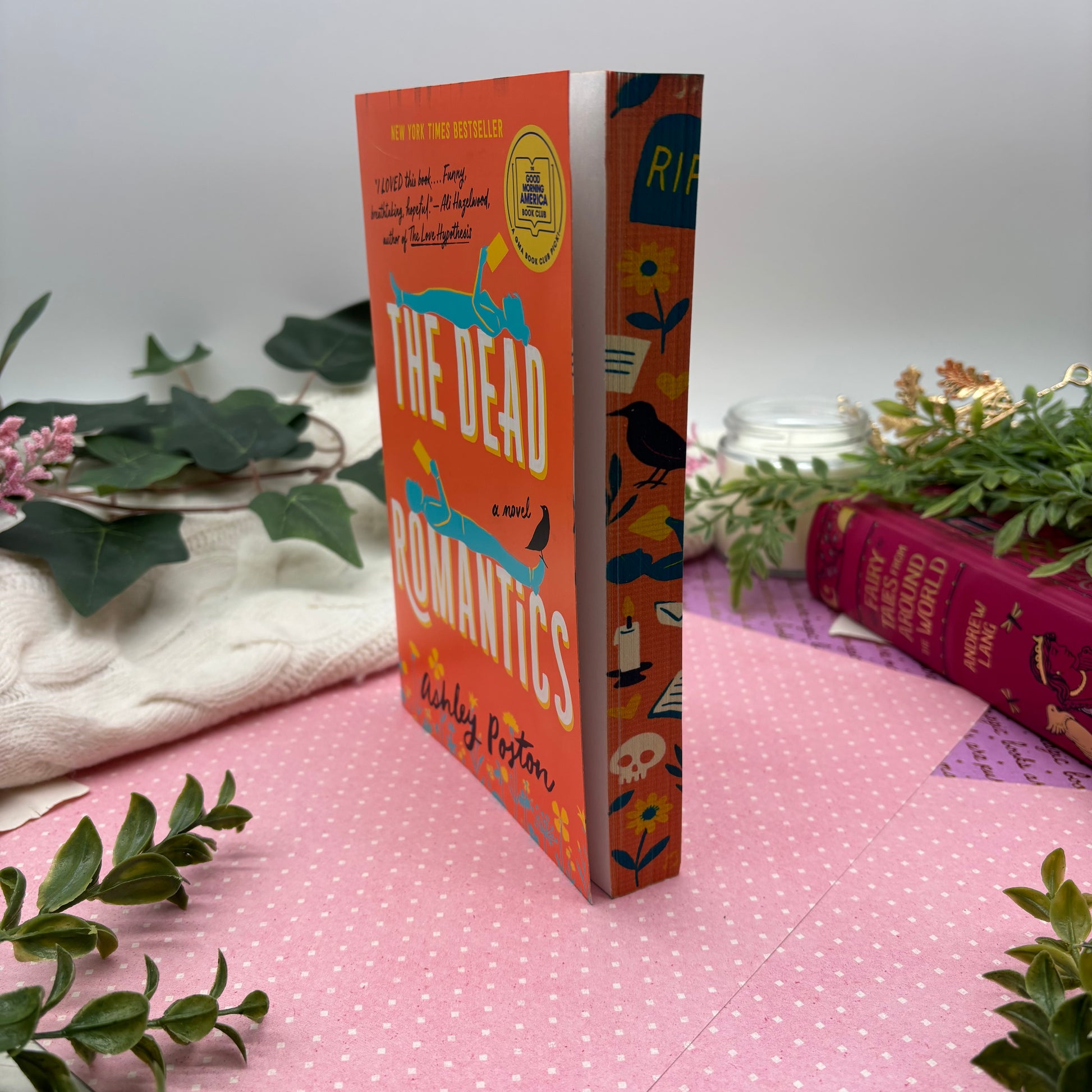 The Dead Romantics by Ashley Poston special edition paperback with custom designed edges side view