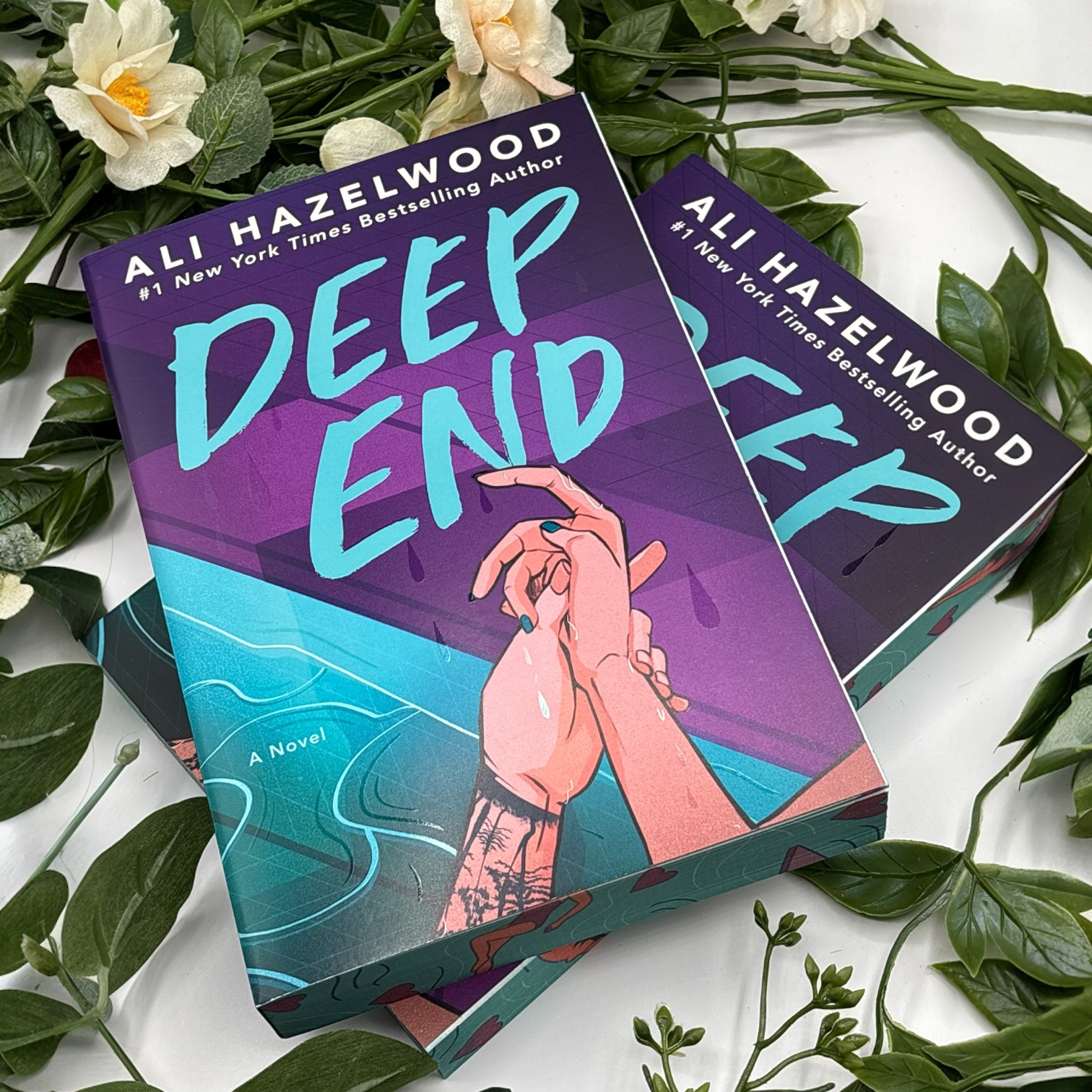 close up of custom edges on Deep End by Ali Hazelwood special edition paperback