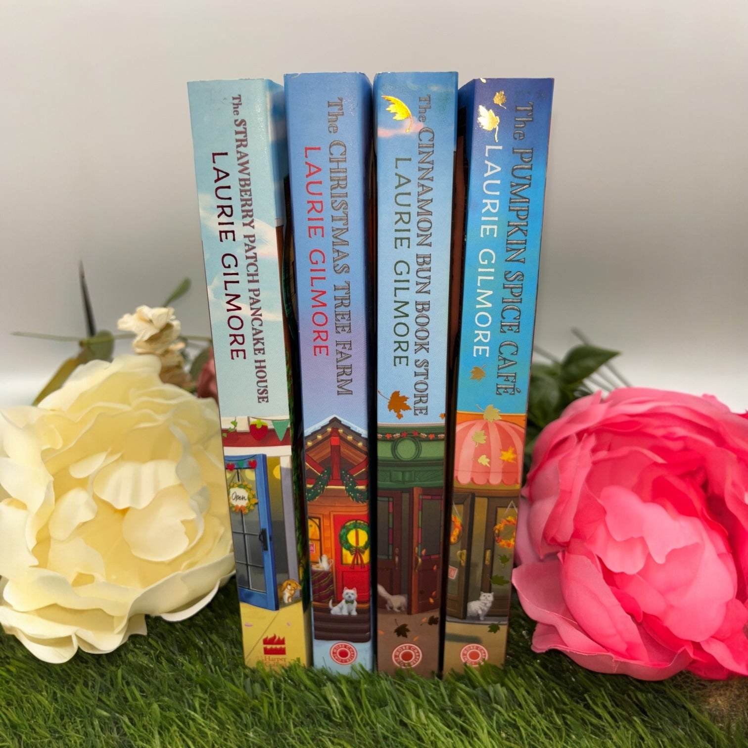 Dream Harbor special edition paperback set with stenciled edges by Laurie Gilmore includes The Pumpkin Spice Cafe, The Cinnamon Bun Book Store, The Christmas Tree Farm, The Strawberry Patch Pancake House spines 
