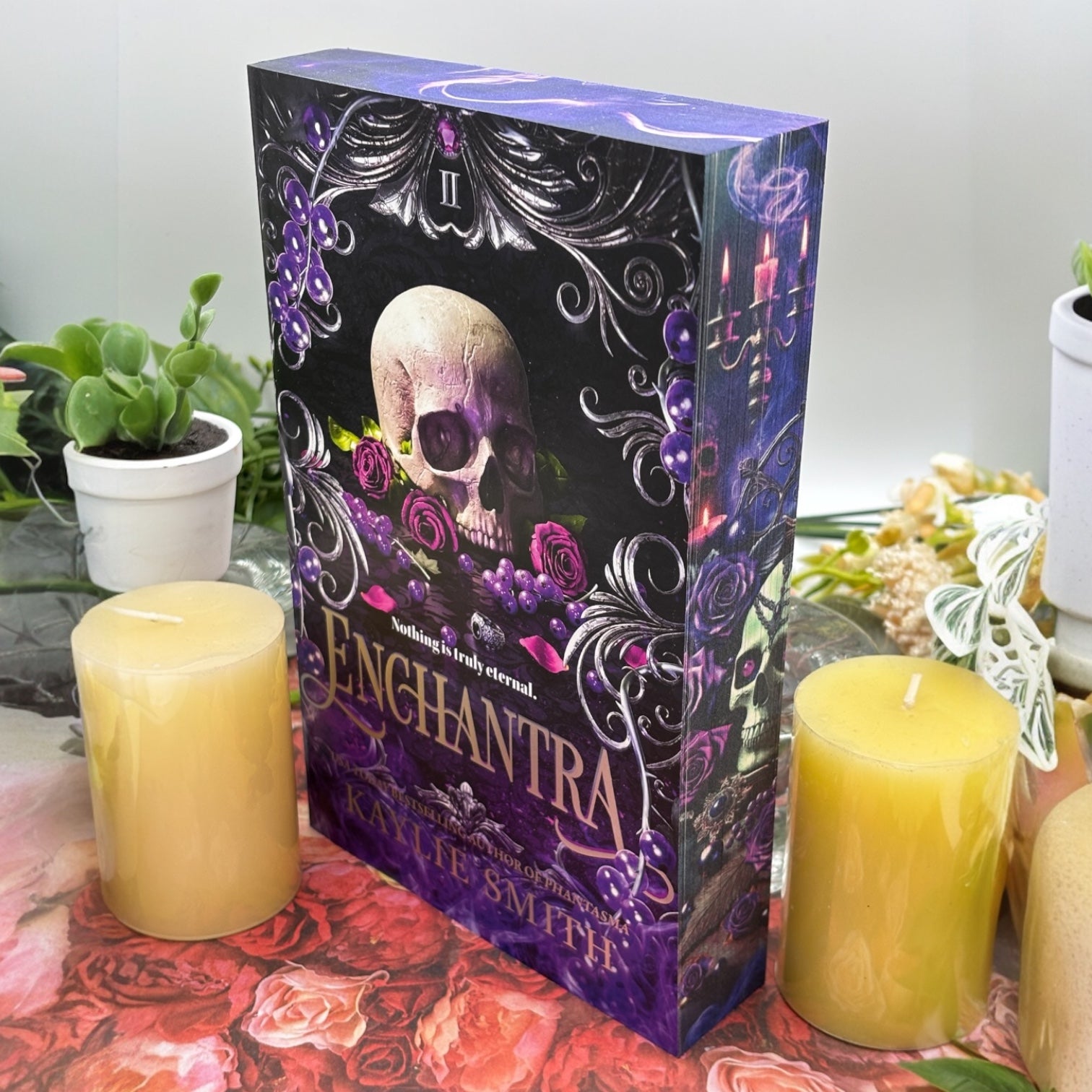 Close-up of custom printed book edges on Enchantra featuring candles and smoke