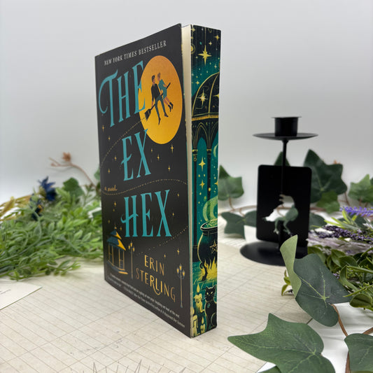 Close-up of the custom stenciled edge design on The Ex Hex paperback