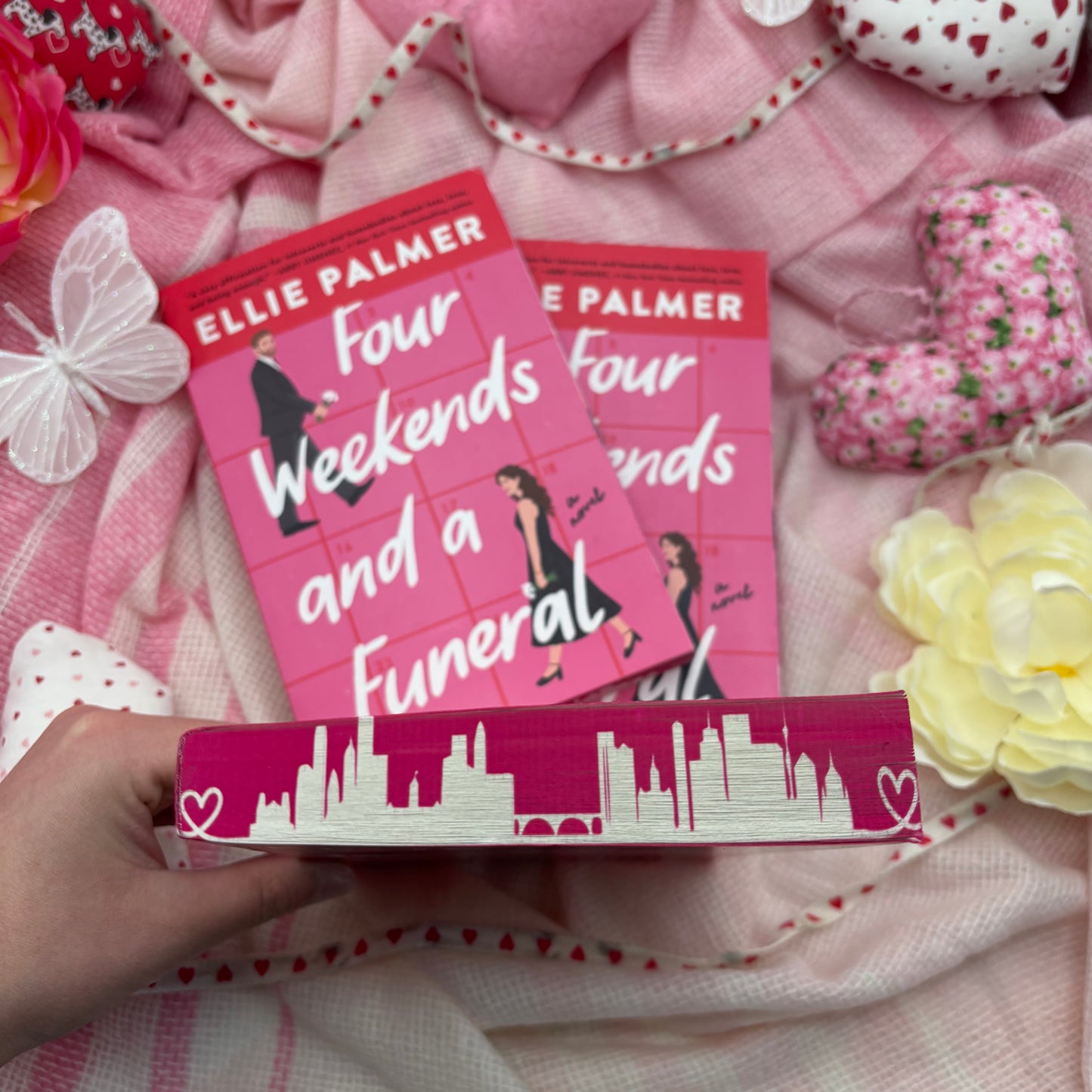 Four Weekends and a Funeral by Ellie Palmer special edition paperback with custom designed edges top view