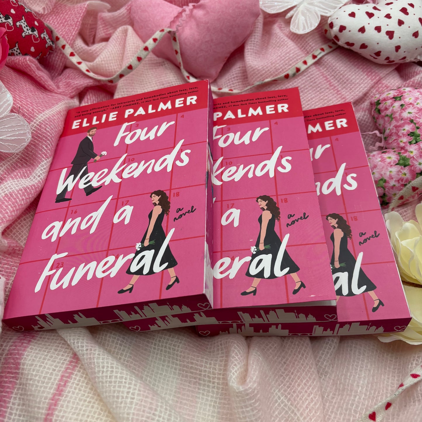 Four Weekends and a Funeral by Ellie Palmer special edition paperback with custom designed edges side view
