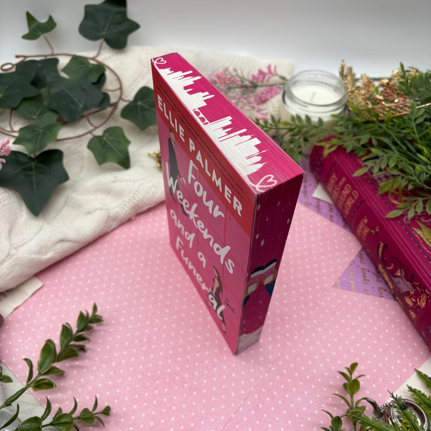 Four Weekends and a Funeral by Ellie Palmer special edition paperback with custom designed edges top view