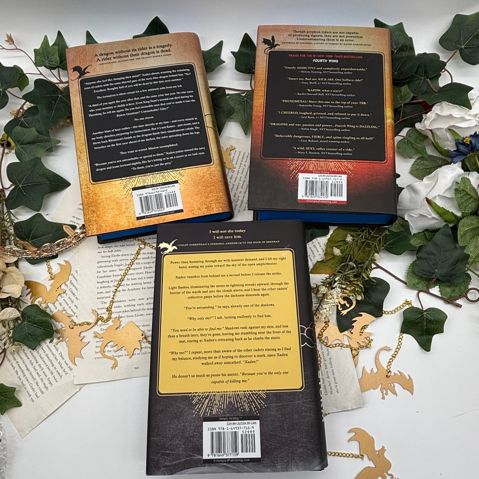 Fourth Wing, Iron Flame, and Onyx Storm special edition hardcovers with sprayed edges back covers