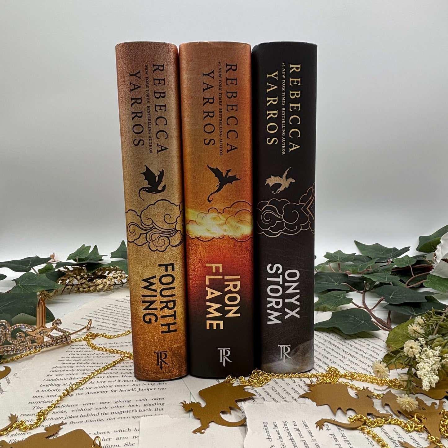 Fourth Wing, Iron Flame, and Onyx Storm special edition hardcovers with sprayed edges spines
