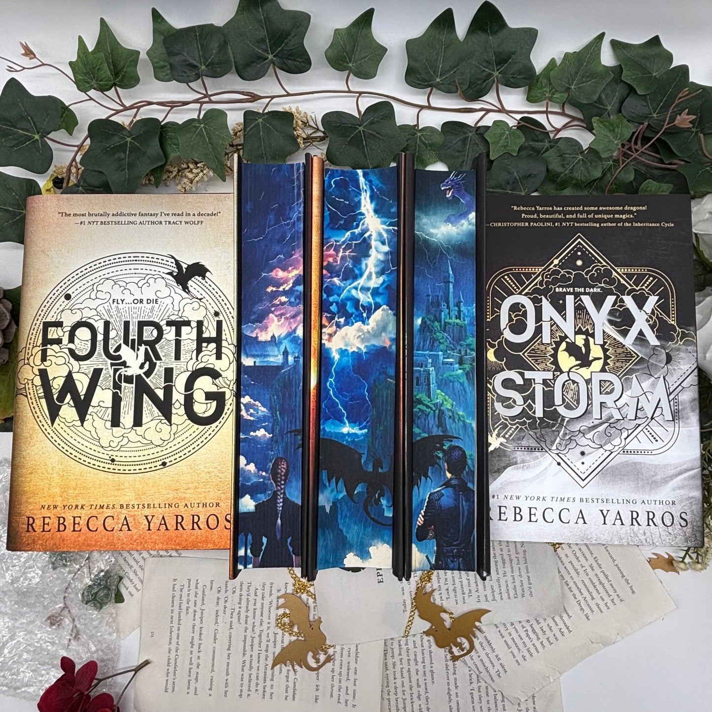 Fourth Wing, Iron Flame, and Onyx Storm special edition hardcovers with sprayed edges