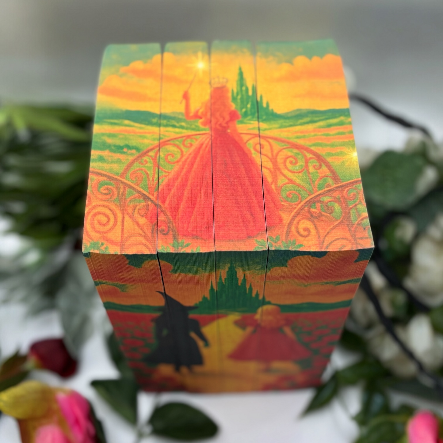 Custom-edged Wicked book set featuring Glinda and the Land of Oz