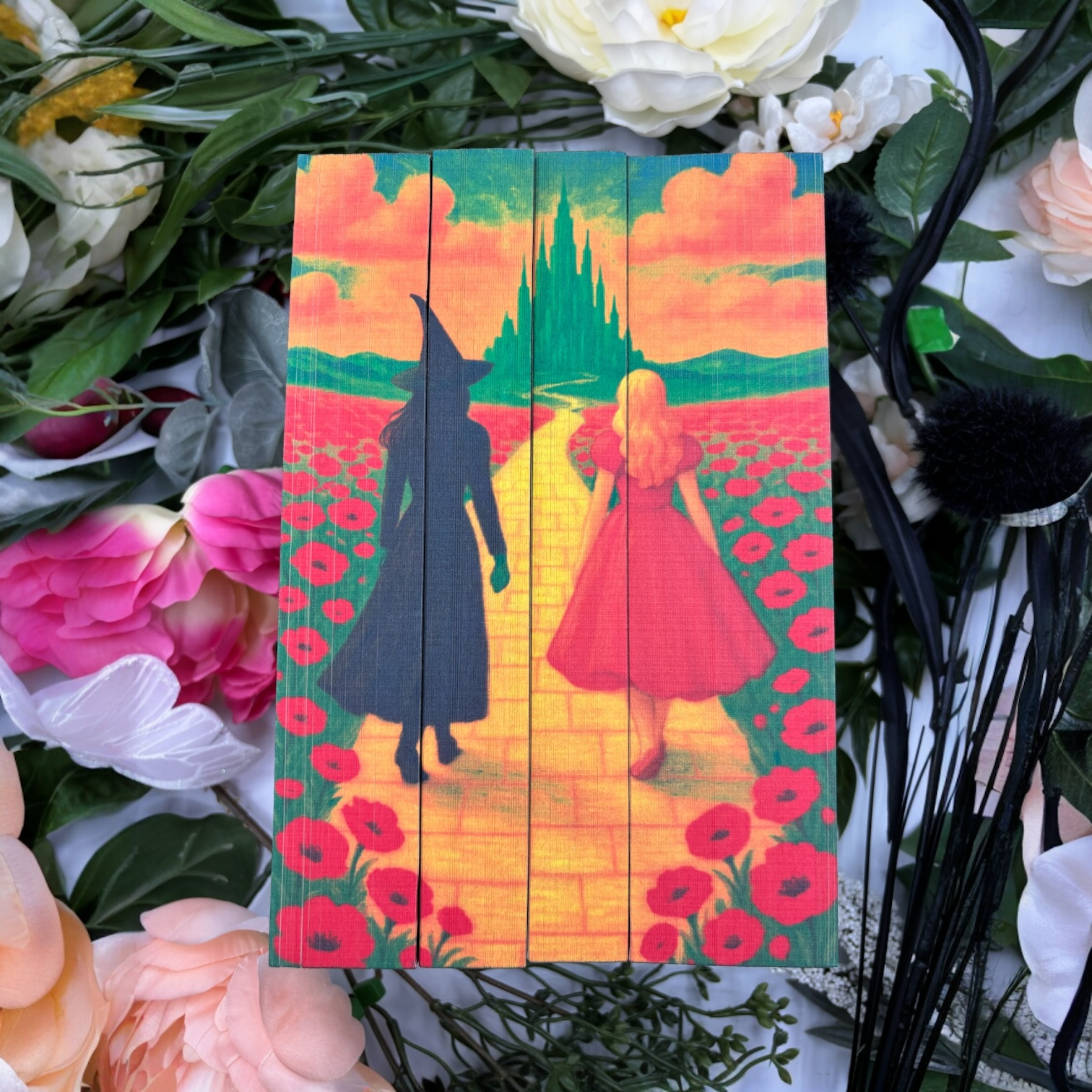 Four-book fantasy set with custom printed edges, Wicked by Gregory Maguire