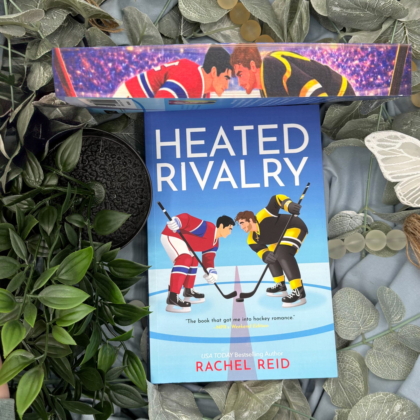 Heated Rivalry by Rachel Reid special edition paperback with custom sprayed edges front view