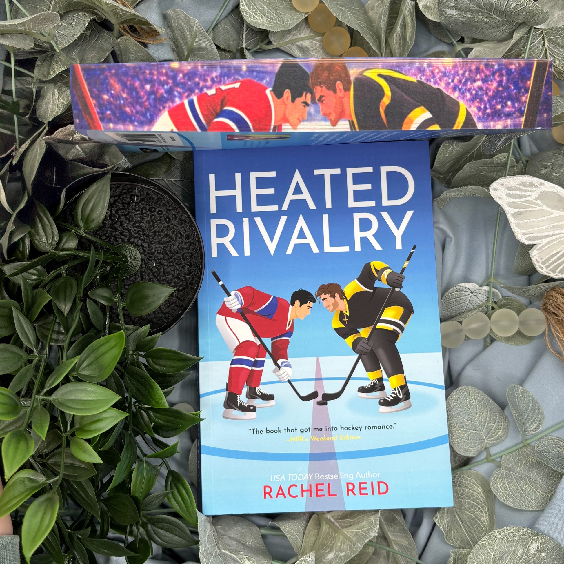 Heated Rivalry by Rachel Reid special edition paperback with custom sprayed edges front view