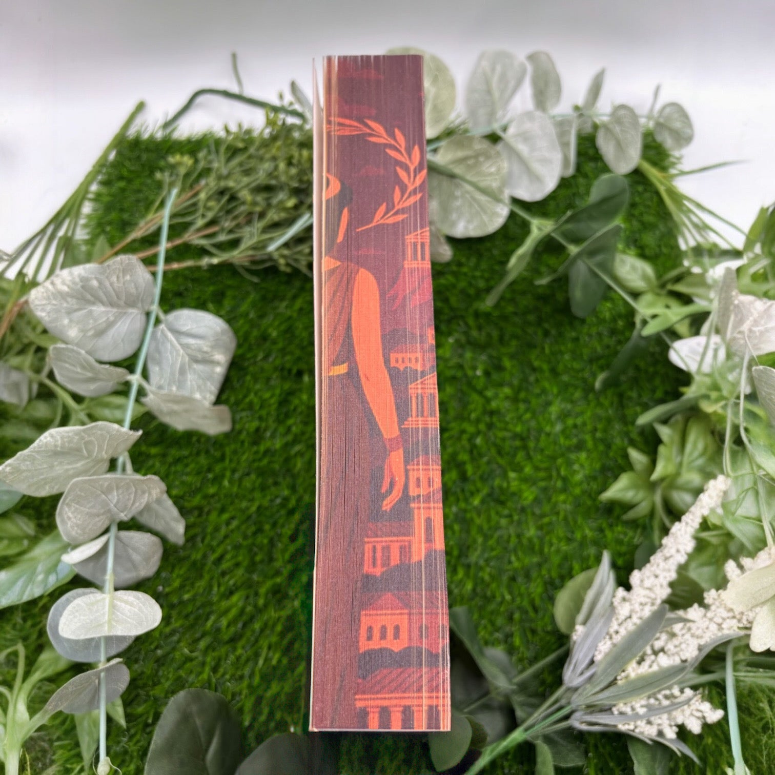 Special edition of Hera by Jennifer Saint paperback with custom printed edges middle