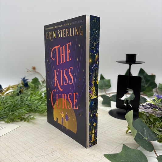 Close-up of custom edge design on The Kiss Curse paperback