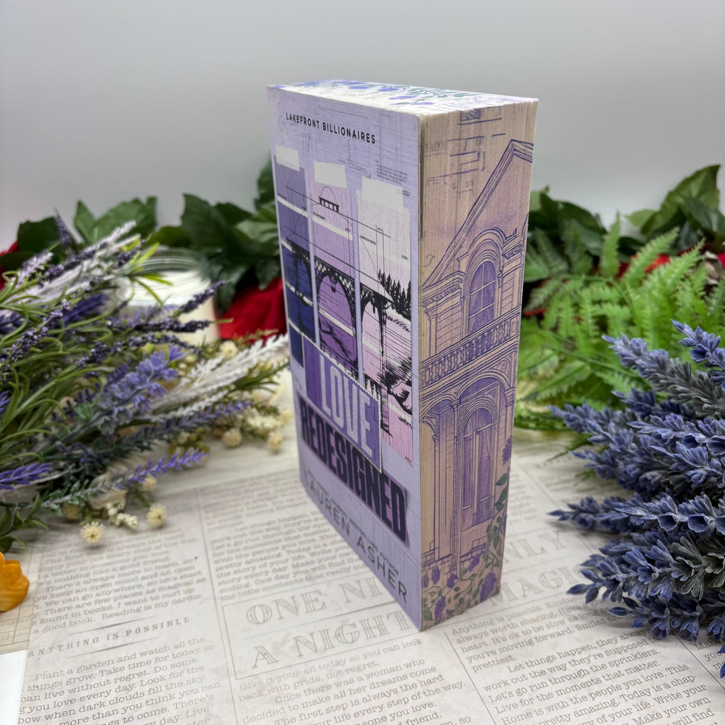 Love Redesigned by Lauren Asher special edition paperback with custom designed edges side view