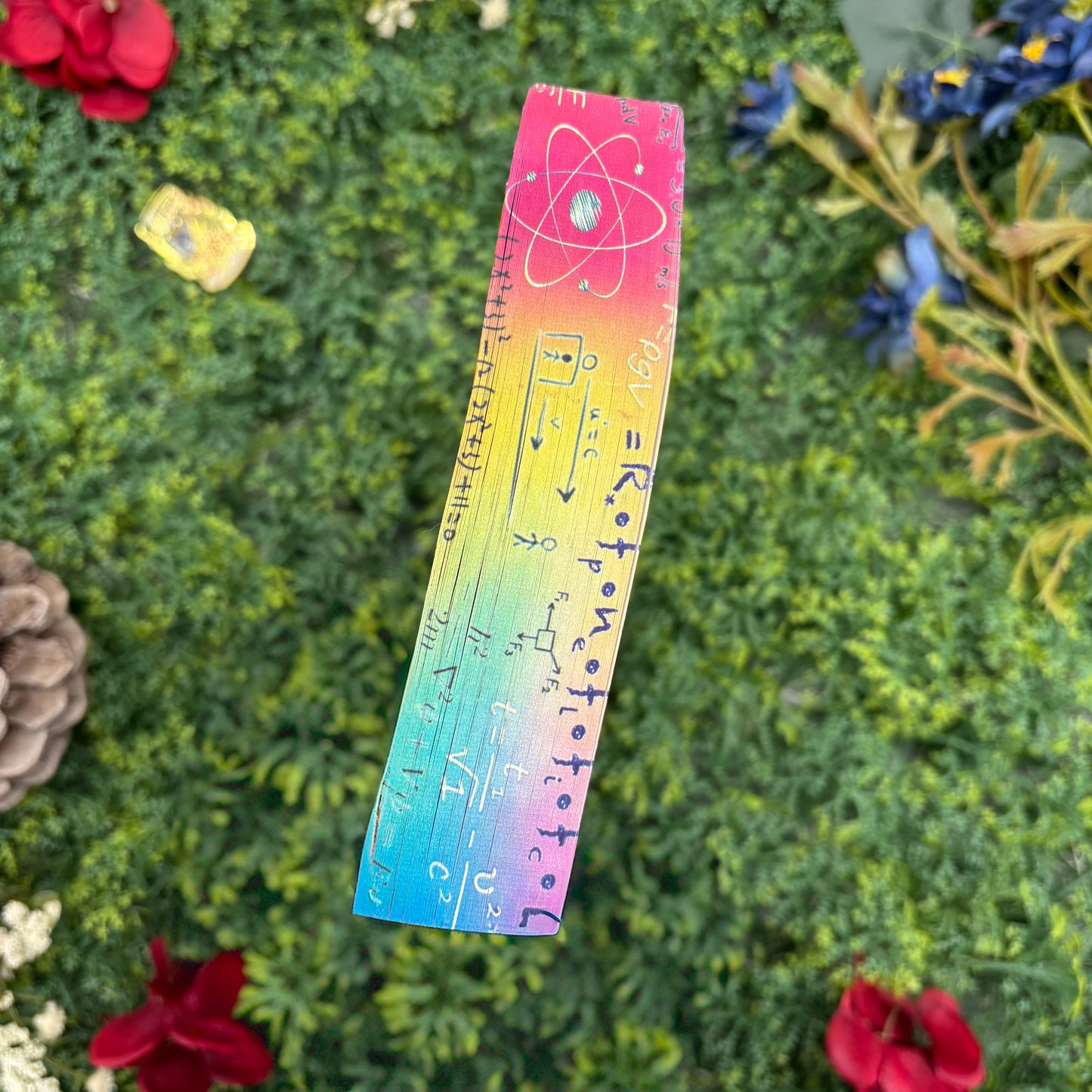 top view of Love, Theoretically paperback showing custom sprayed edges special edition