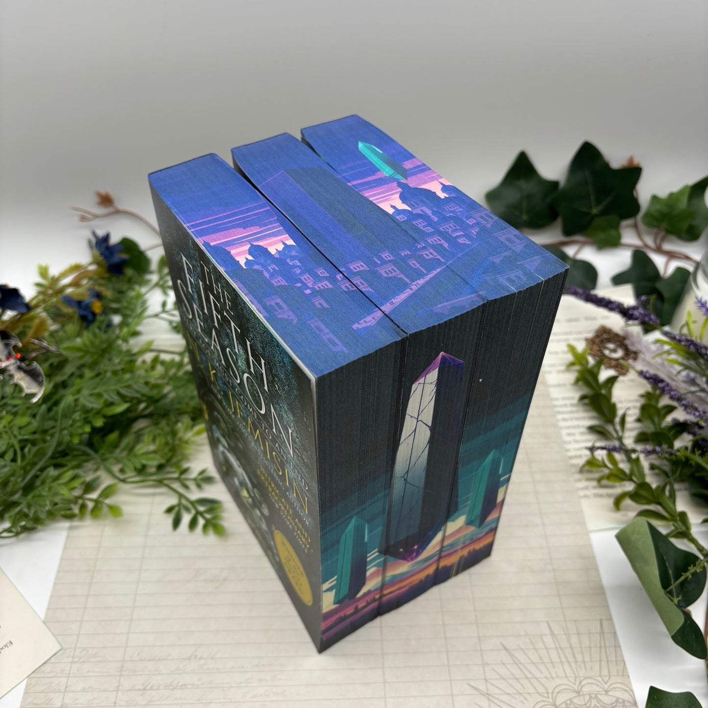 The Fifth Season by N.K. Jemisin with stenciled custom edges in paperback edition