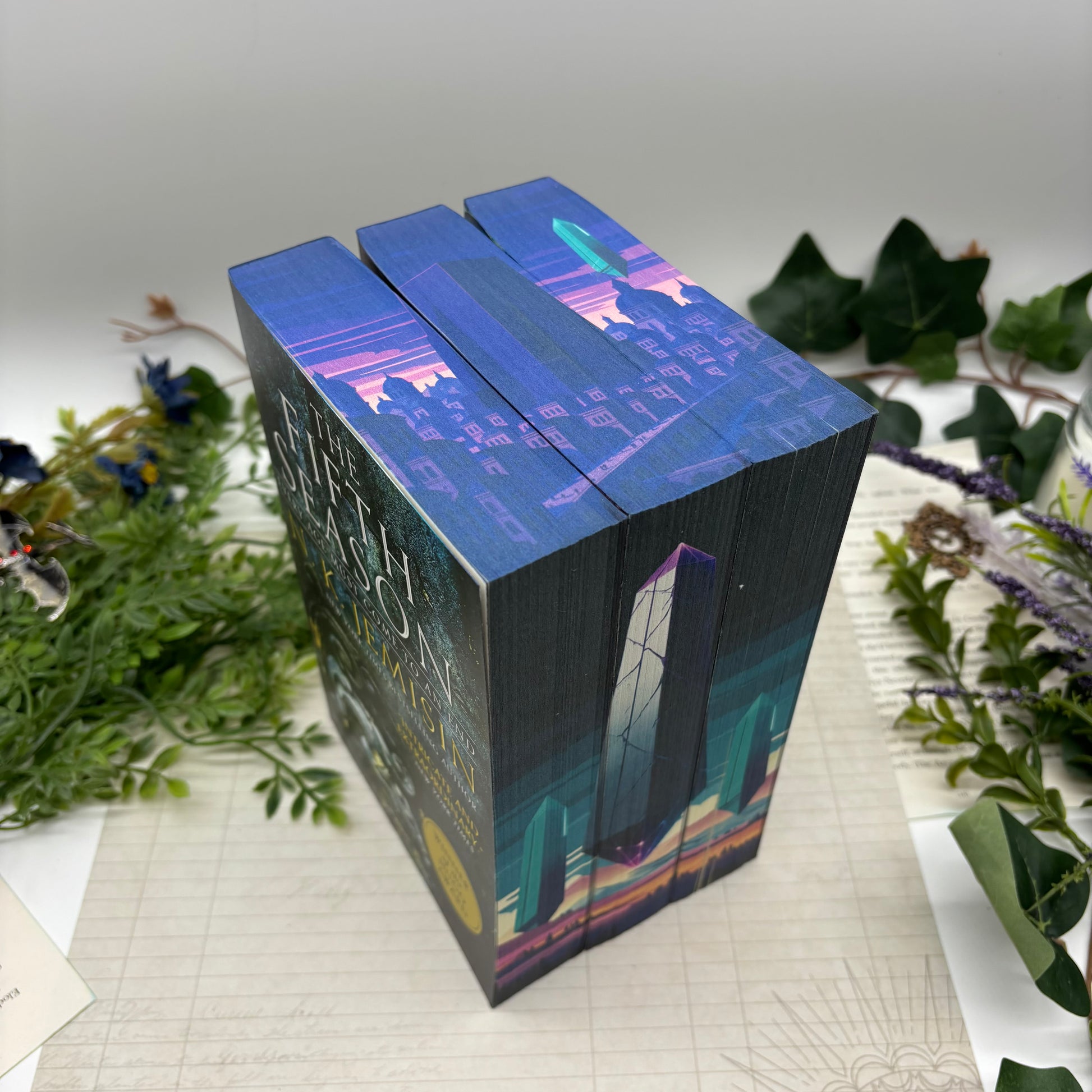 The Fifth Season by N.K. Jemisin with stenciled custom edges in paperback edition