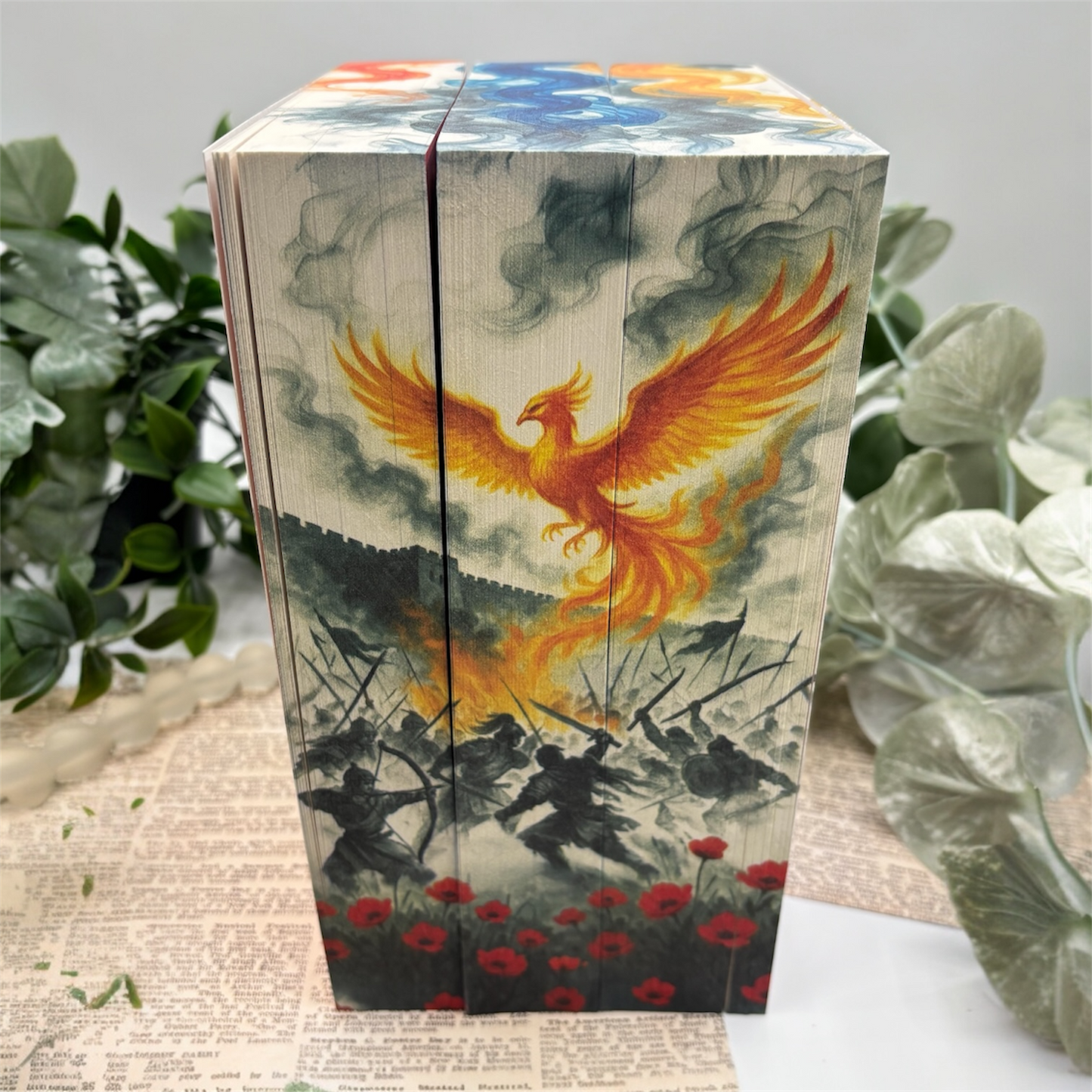 The Poppy War trilogy paperback books showing custom sprayed edges design
