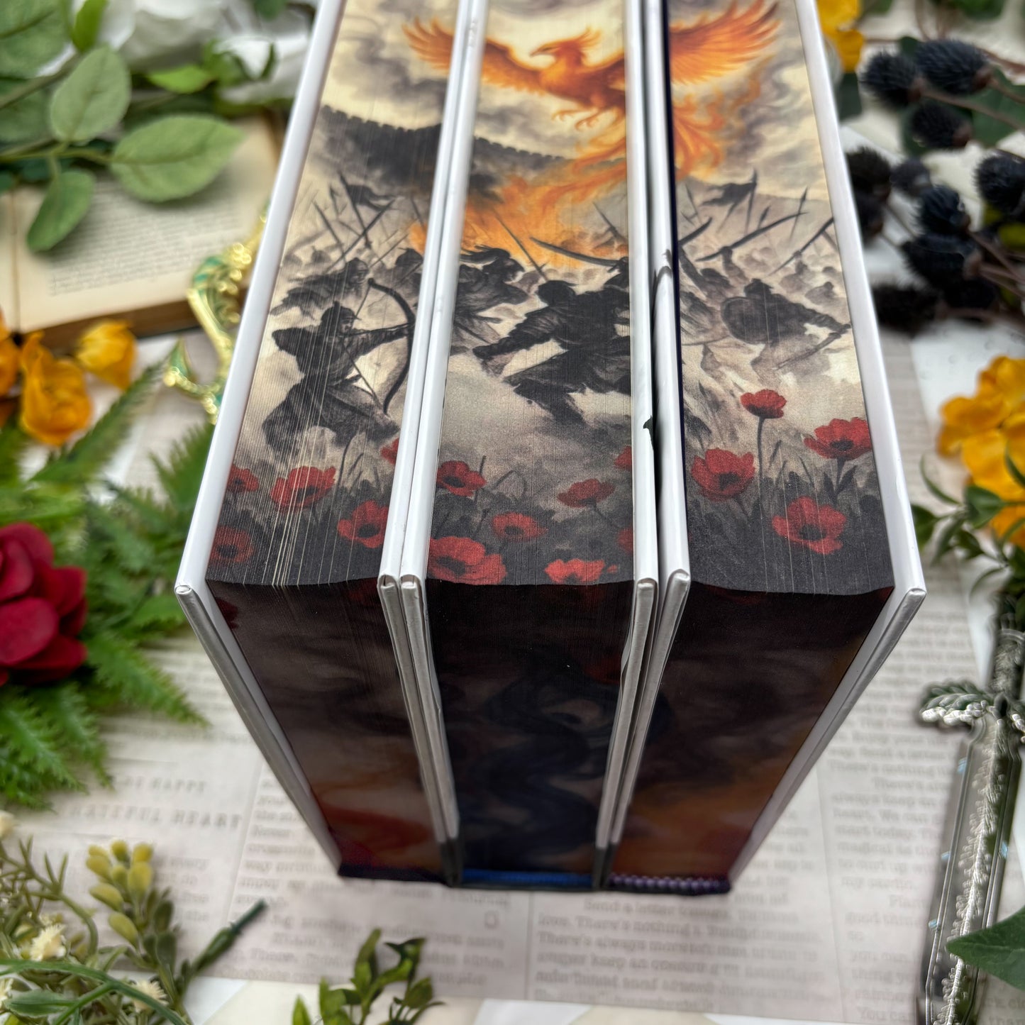 Special edition hardcover set of The Poppy War trilogy by R.F. Kuang with custom designed book edges