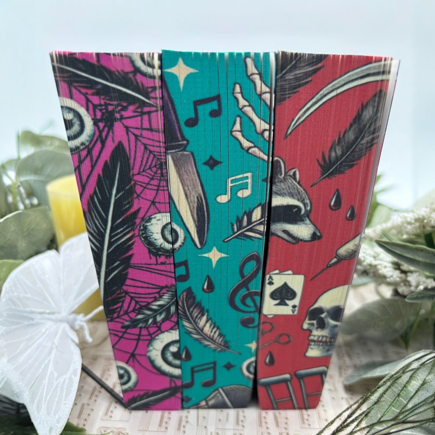 Bottom view of custom edge painted books from Ruinous Love Trilogy special edition