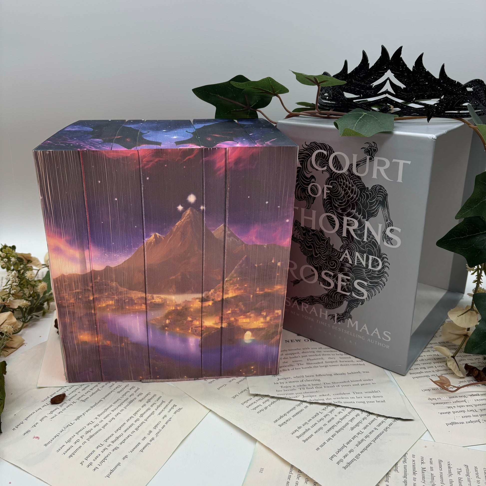 Sarah J. Maas fantasy book stack featuring Velaris Edition with custom designed edges