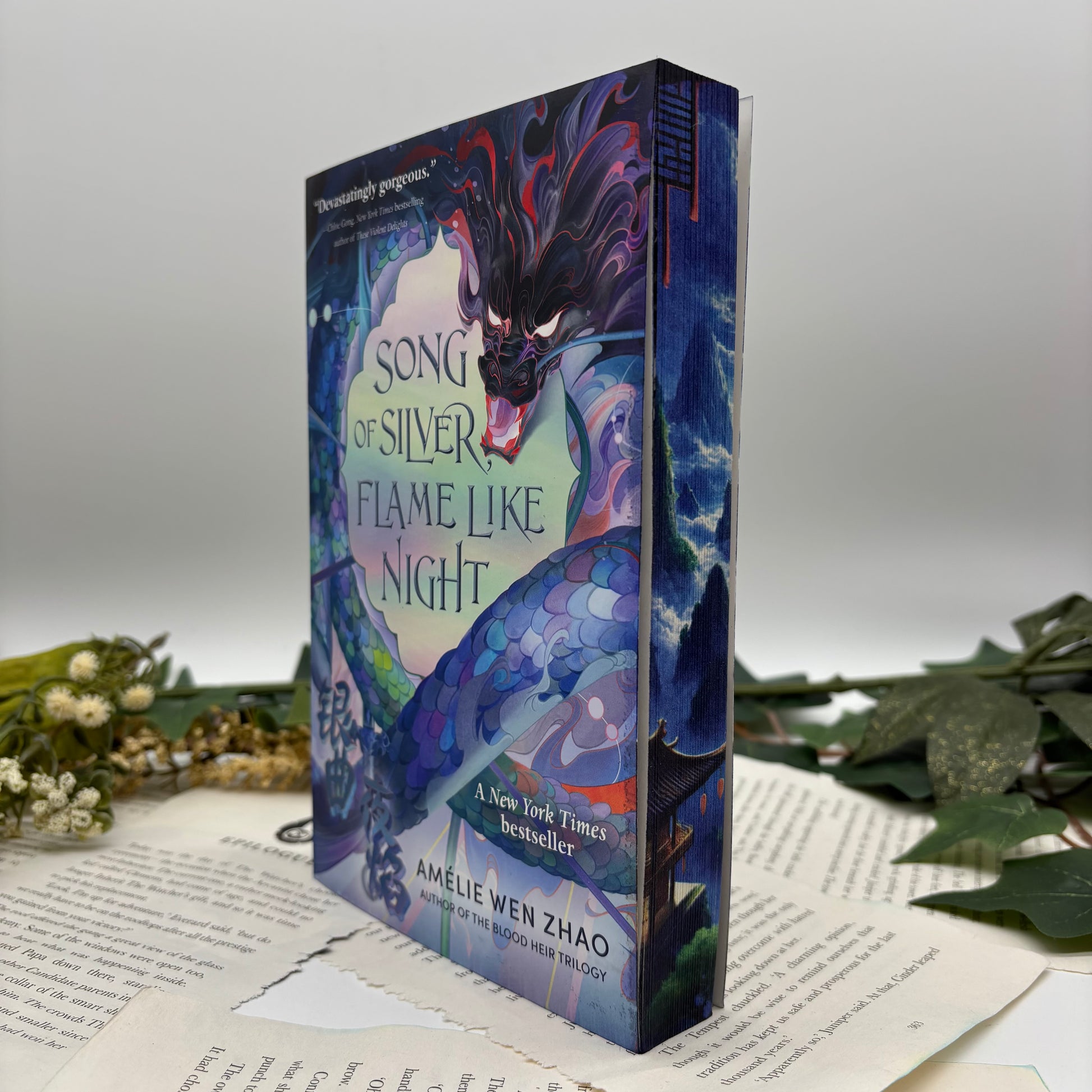 Song of Silver Flame Like Night by Amélie Wen Zhao special edition paperback with custom designed edges front view