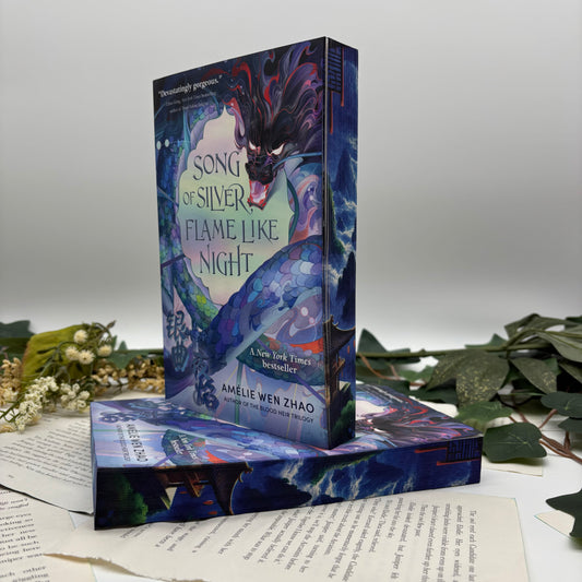 Song of Silver Flame Like Night by Amélie Wen Zhao special edition paperback with custom designed edges front view