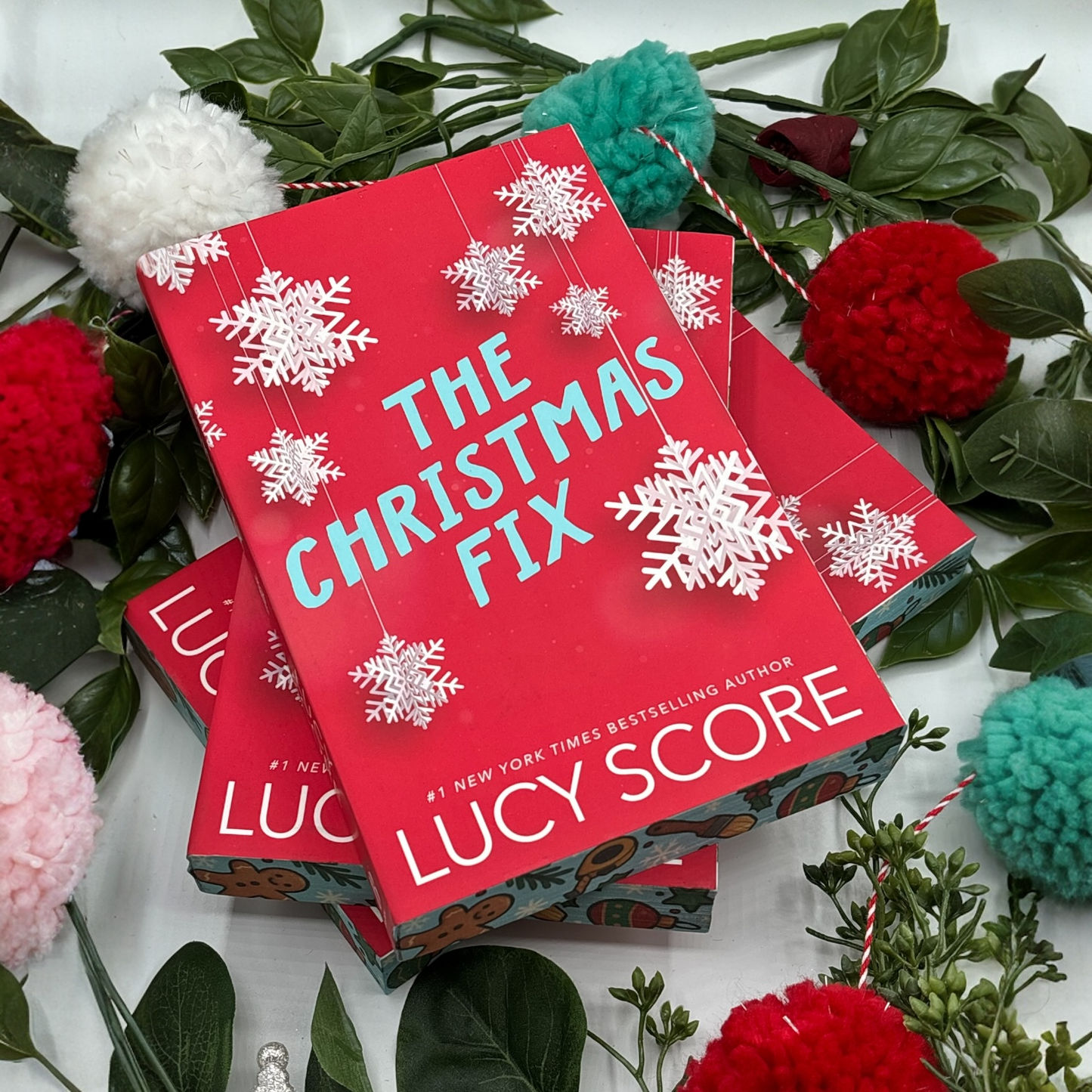 The Christmas Fix by Lucy Score special edition paperback with holiday custom edges front cover view