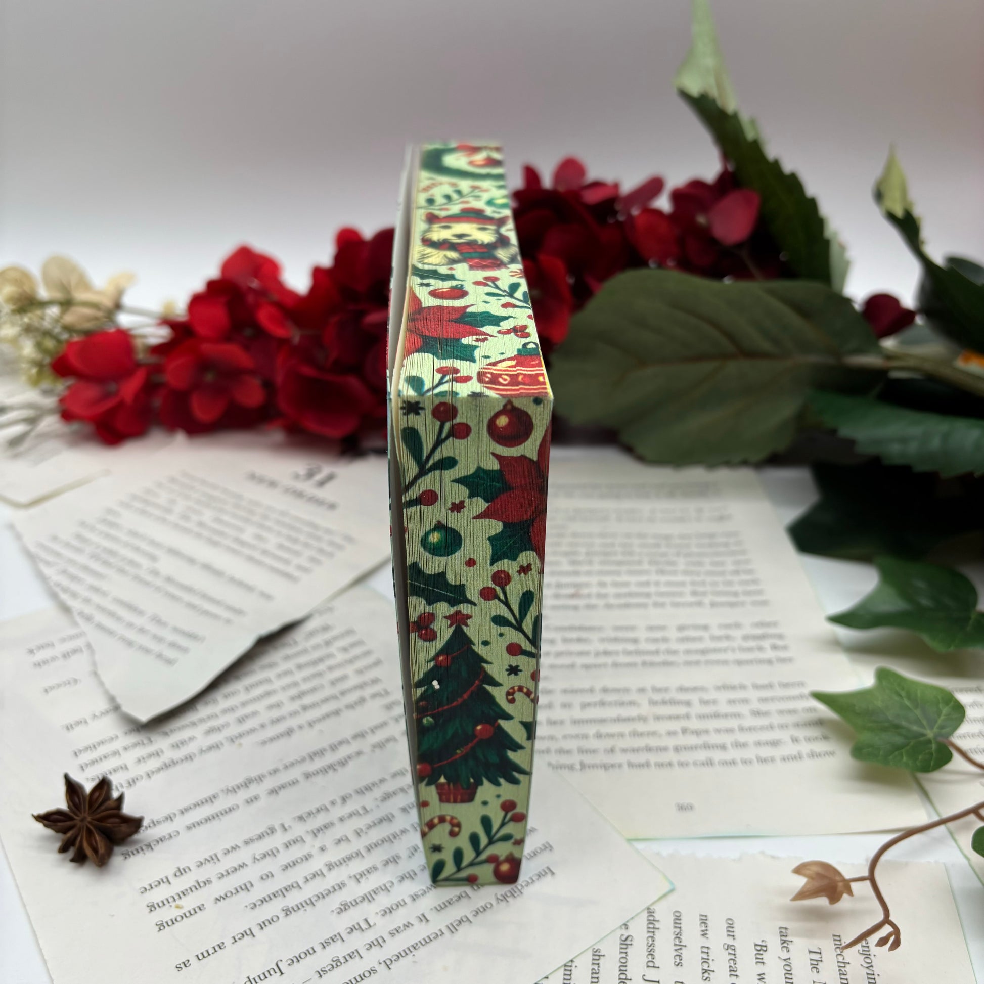 The Christmas Tree Farm special edition paperback with stenciled edges by Laurie Gilmore middle