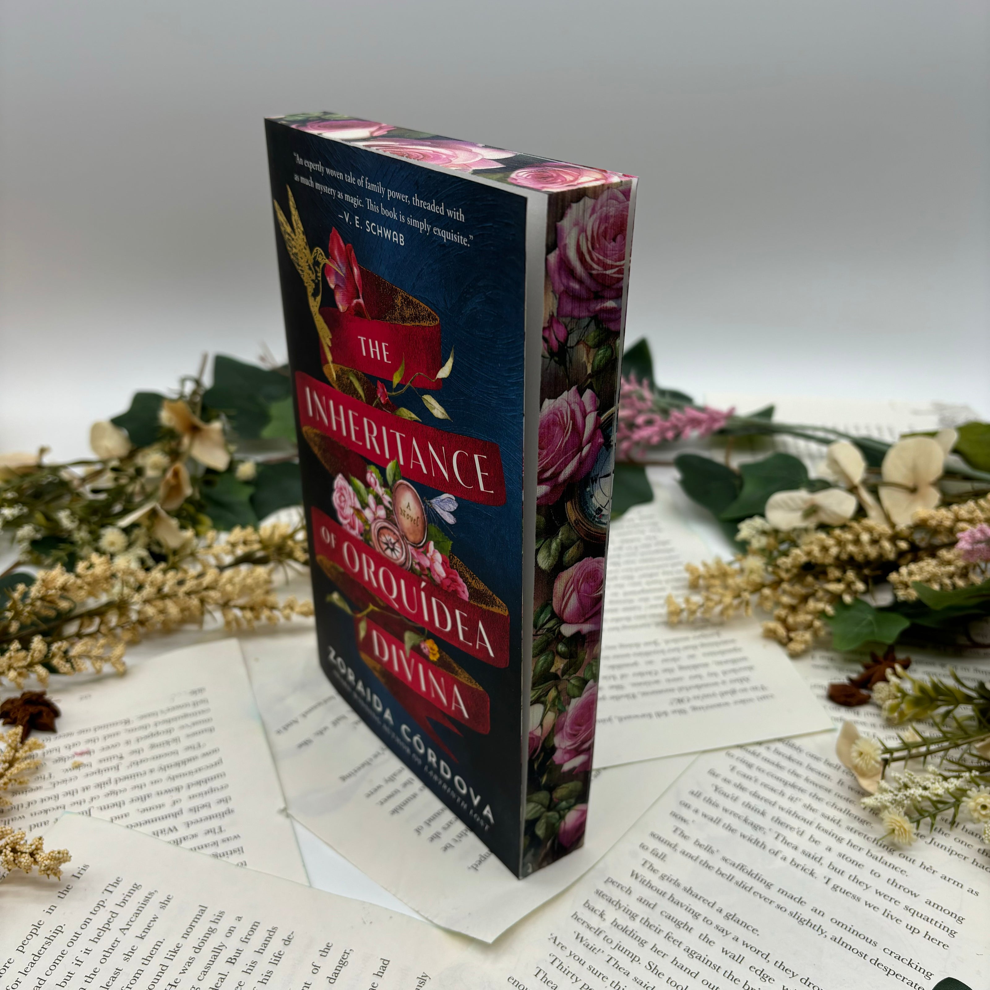 The Inheritance of Orquidea Divina by Zoraida Cordova special edition paperback book with custom edges