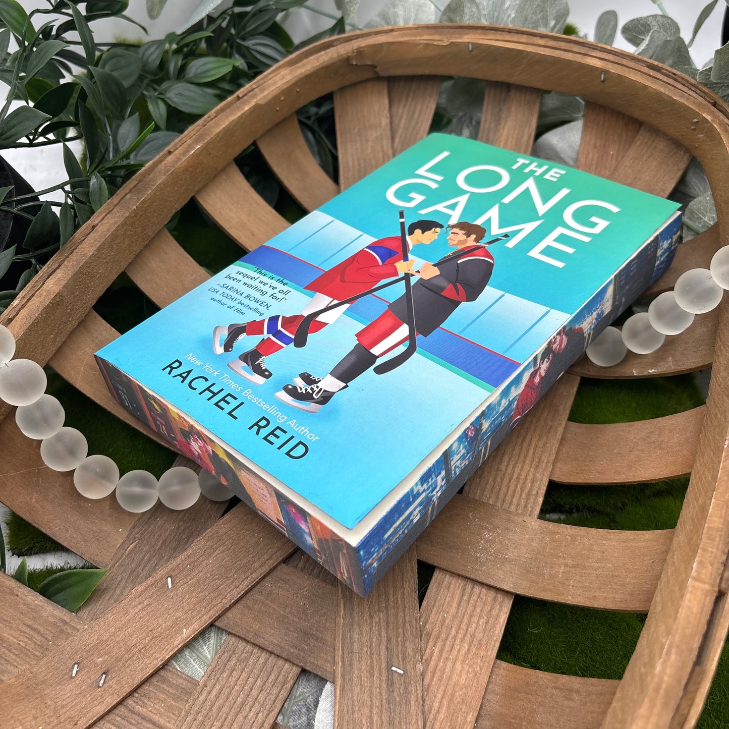 The Long Game by Rachel Reid special edition paperback with custom designed edges front view