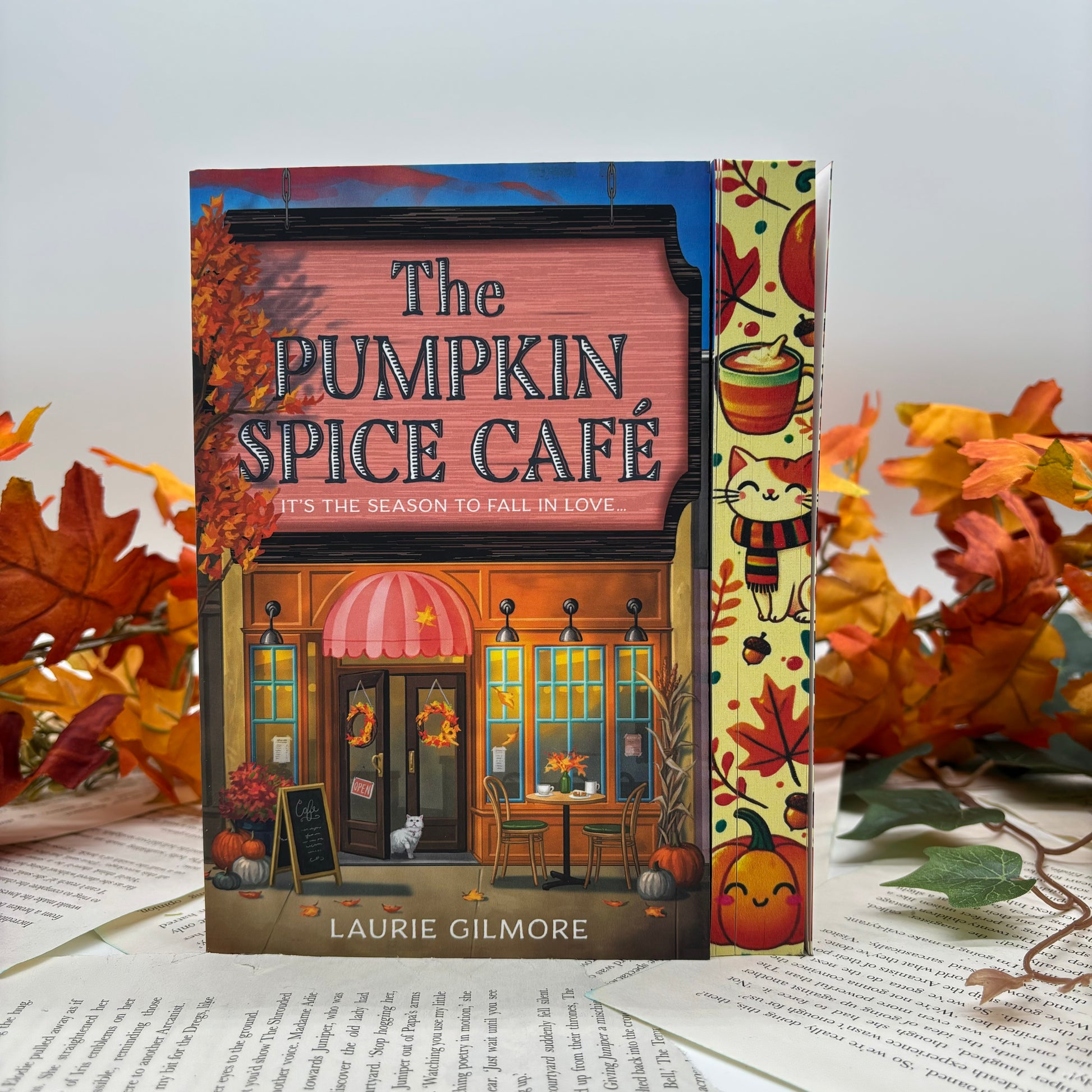The Pumpkin Spice Cafe special edition paperback with stenciled edges by Laurie Gilmore middle