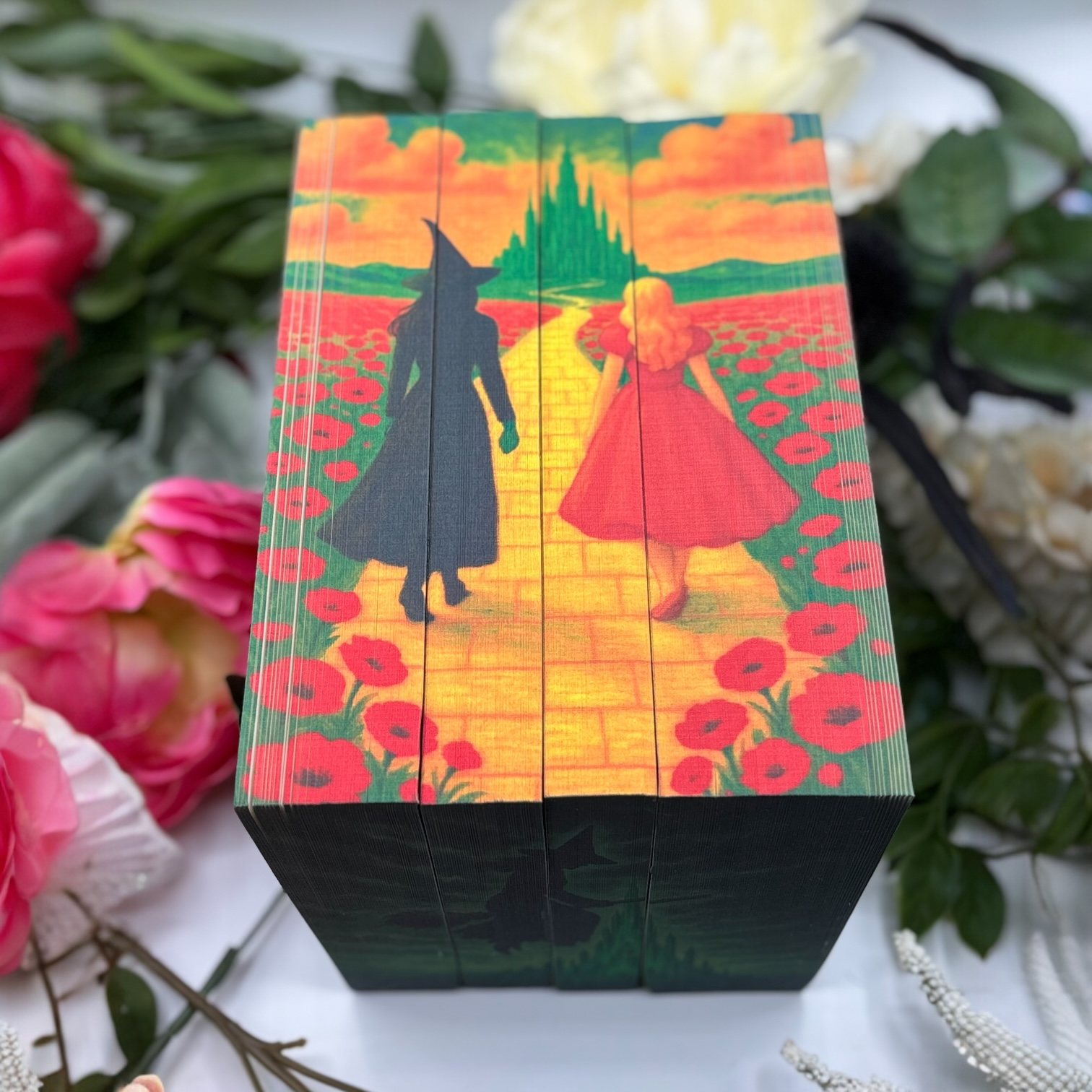 Four-book fantasy set with custom printed edges, Wicked by Gregory Maguire